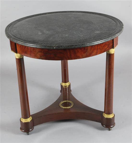 An Empire ormolu mounted mahogany centre table, Diam.2ft 8in. H.2ft 6in.